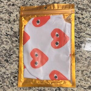 White Face Mask with Red Heart Eye Print